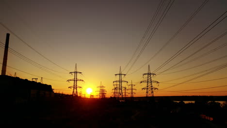 high voltage post. aerial view of power lines in natural landscape