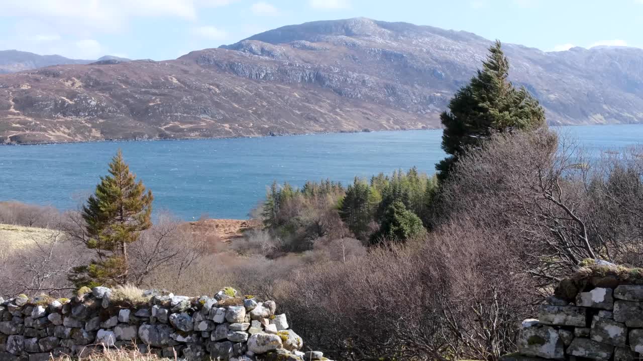 Beautiful scenic view overlooking Loch Gleann Dubh and mountains near Kylesku Bridge in Assynt district of Sutherland, highlands of Scotland UK