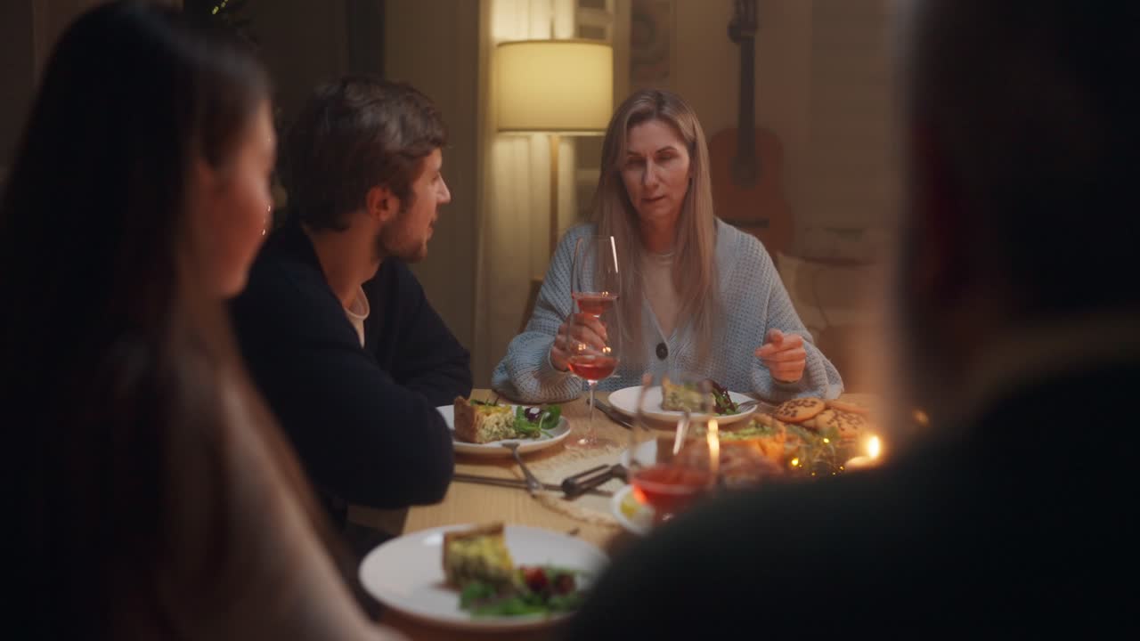 A group of people having dinner together
