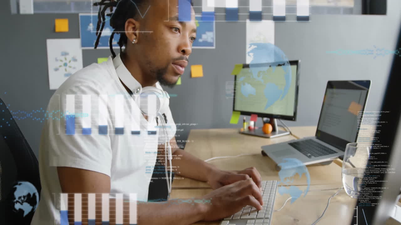 Animation of financial data processing over african american businessman using computer in office