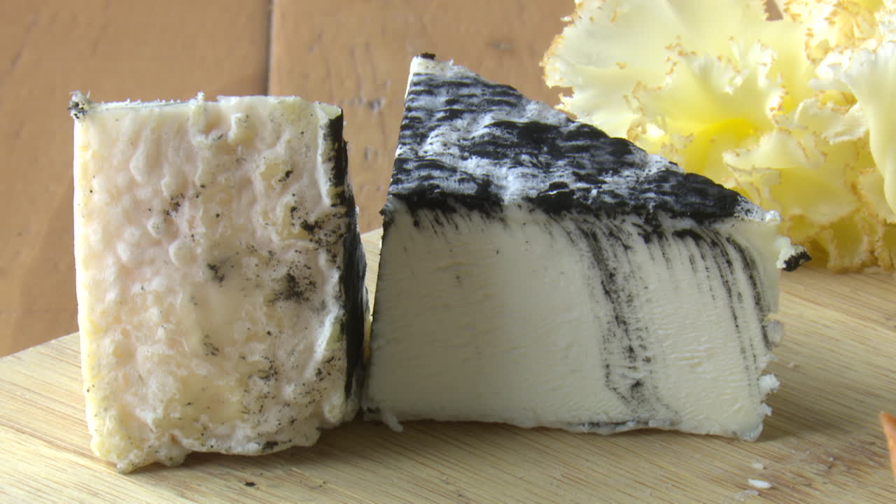 Sliced Aged Cheese with Black Mold