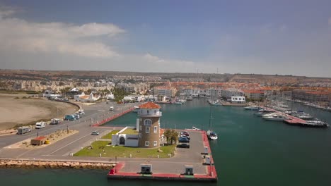 The-lighthouse-of-Almerimar-in-Almeria-during-a-sunny-summer-day