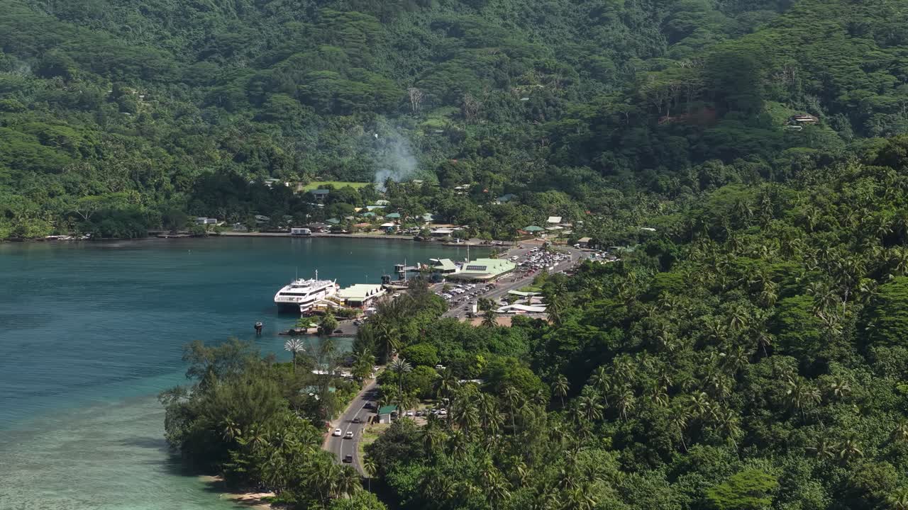 Moorea Island, French Polynesia. Drone Shot of Island's Harbor and Green Landscape