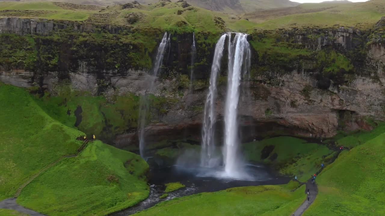 Exploring Seljalandsfoss waterfall in Iceland during summer