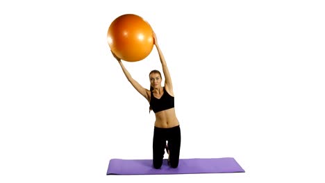 woman doing exercise with yoga ball