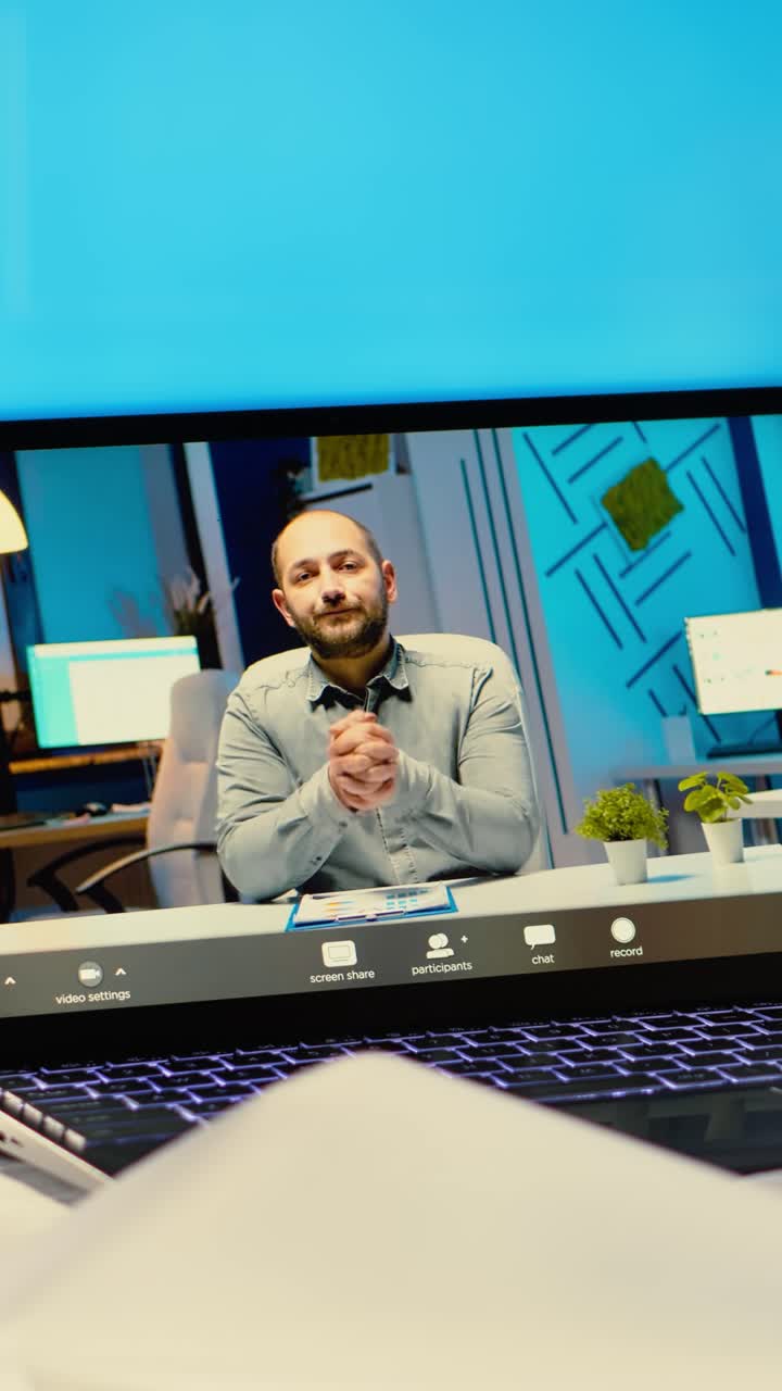 Man on Video Call Discussing Business from Home Office