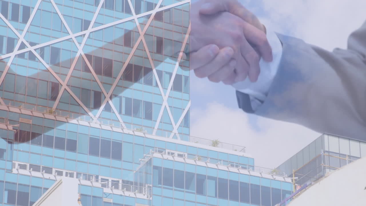 Geometric patterns covering modern glass skyscraper against cloudy blue sky