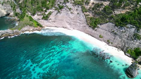 aerial drone video of diamond beach in nusa penida bali during the day