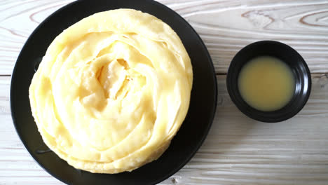 fried crispy roti dough with sweetened condensed milk