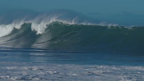 beautiful slow motion slo mo ocean waves crashing and breaking off the sea shore in hawaii