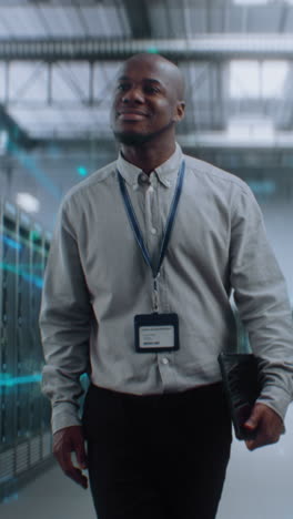 it professional walking through a data center