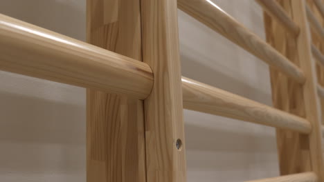 close-up of wooden wall bars for physical exercises