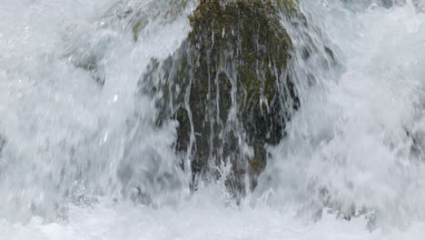 close up of mountain river in the wood in slow motion. beautiful wildlife landscape.