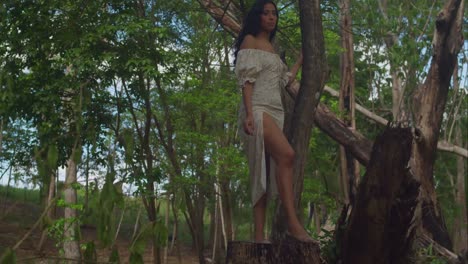 a young latina girl, wearing a dress, savors the lively surroundings of a park in trinidad, a caribbean island