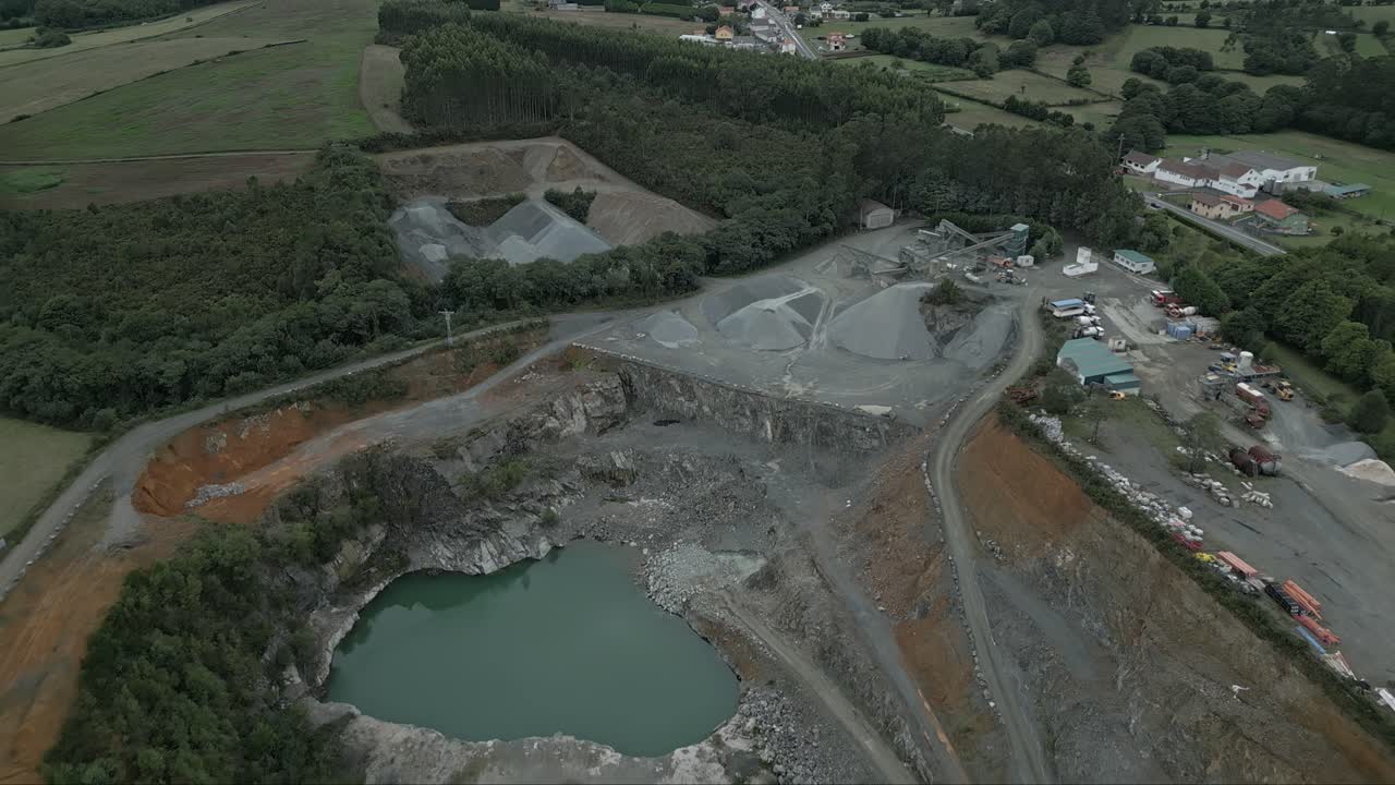 Aerial forward view of quarry in Moeche, Galicia, Spain