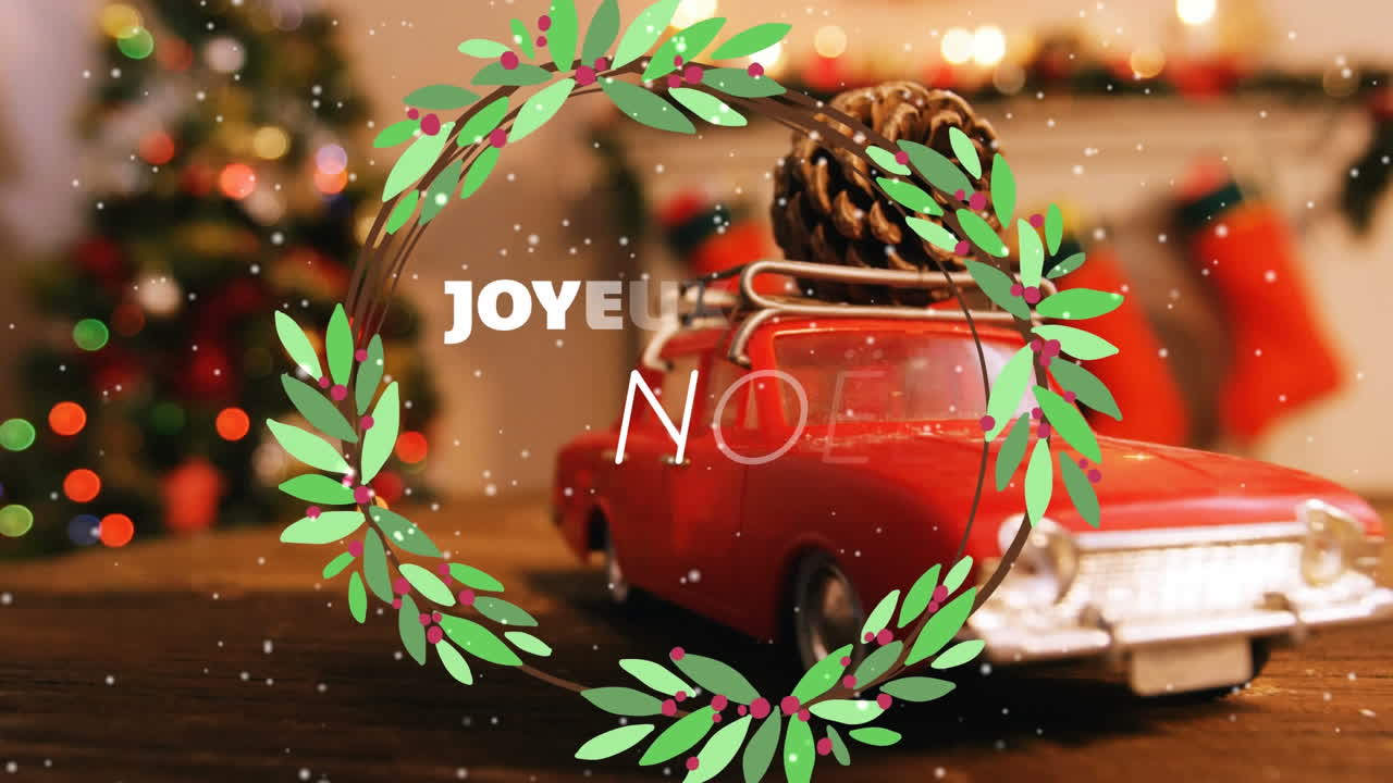 크리스마스 축하 문자와 장식에 눈이 내리는 애니메이션