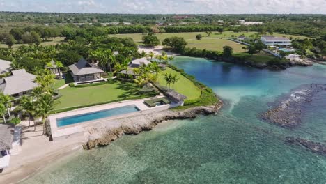 luxury villa and resort next to playa caleton on caribbean coast in la romana, dominican republic. aerial shot