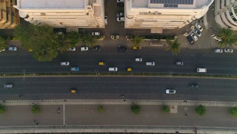 Drone-shots-of-the-most-iconic-walkway-of-South-Bombay,-Marine-Drive,-also-known-as-The-Queen's-Necklace-as-seen-before-The-Great-Mumbai-Coastal-Road-is-made