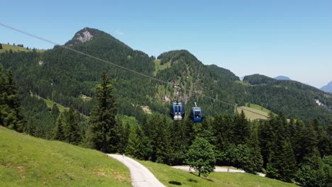 Steep-rope-way-leading-up-a-mountain-in-the-Alps-in-Lofer,-Austria