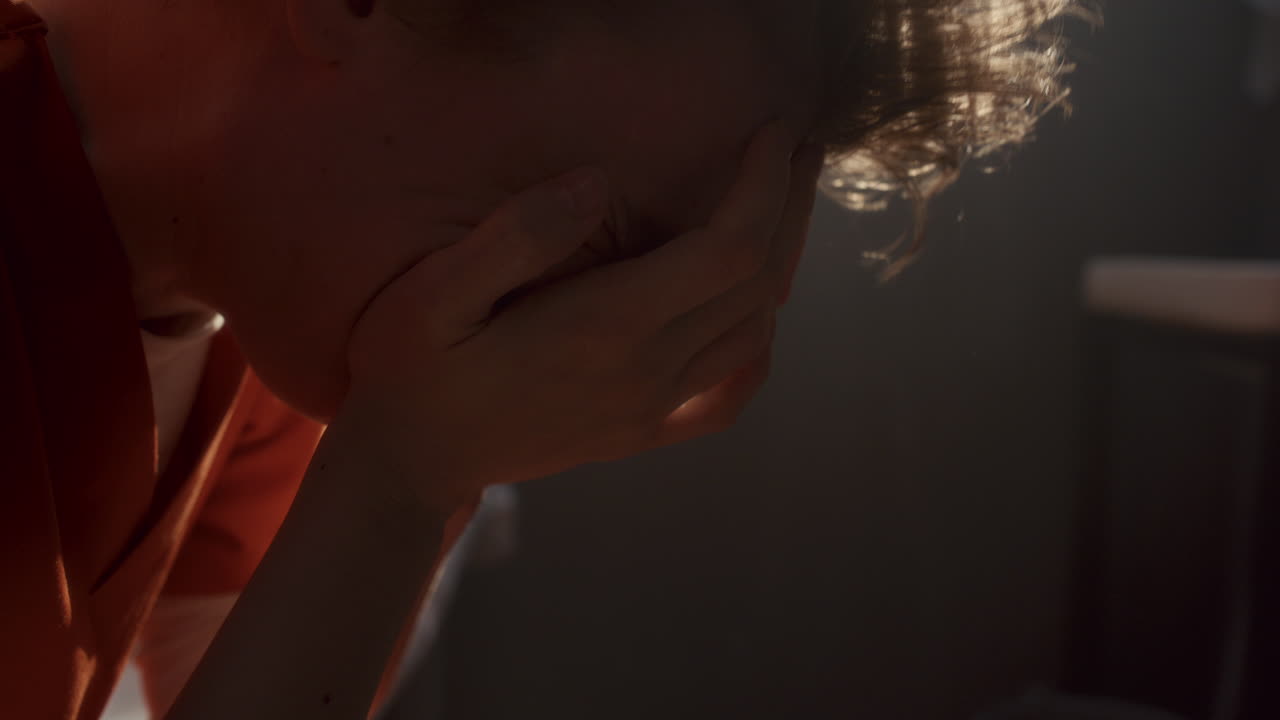 Female Inmate Crying in Frustration and Hopelessness in Prison Cell