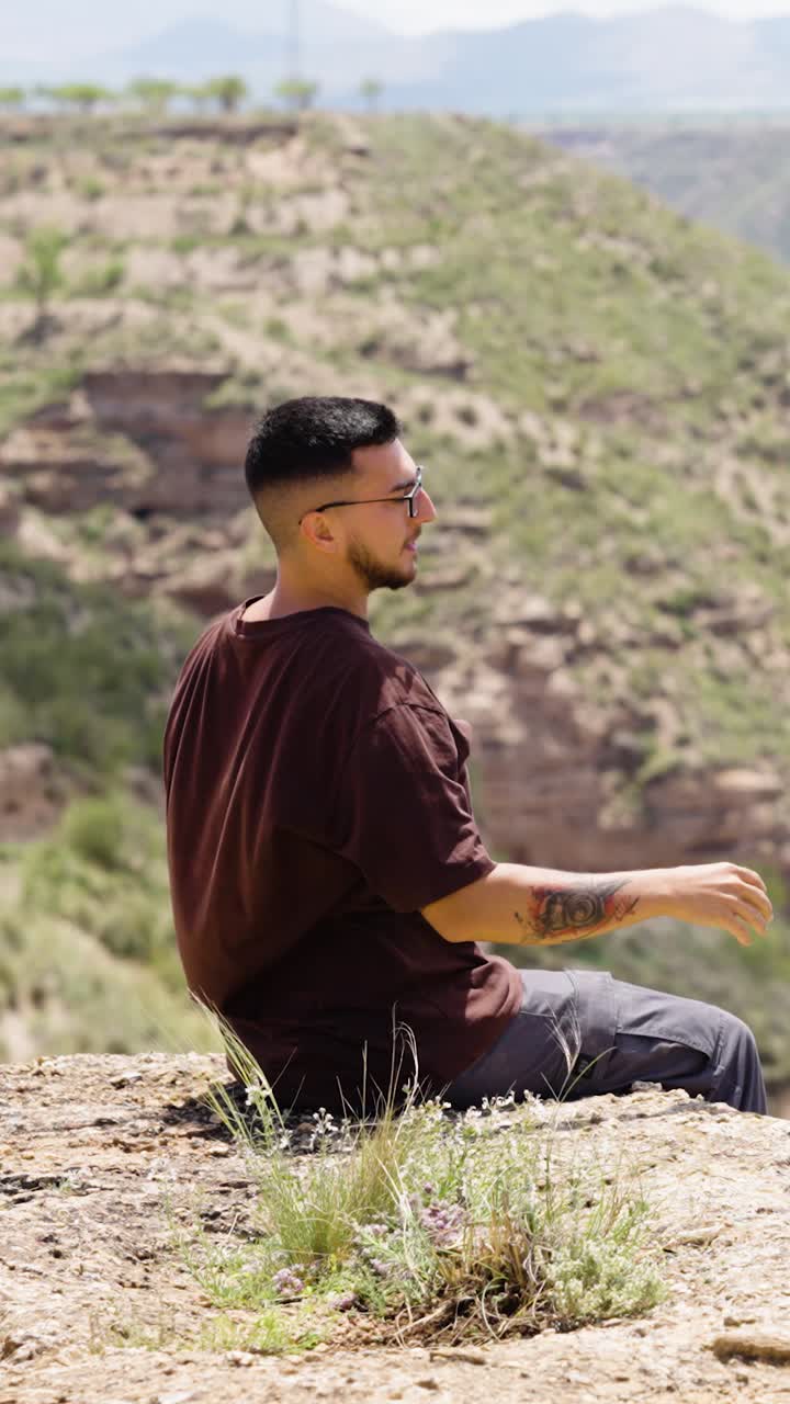 Tourist enjoying scenic view in gorafe, spain. Vertical
