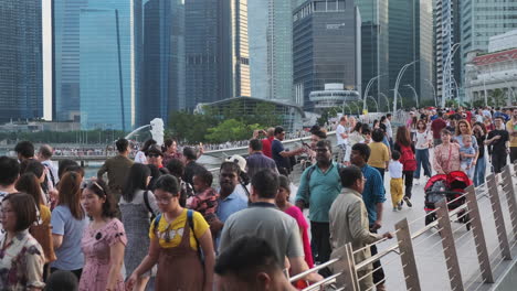 crowded bridge in singapore's marina bay