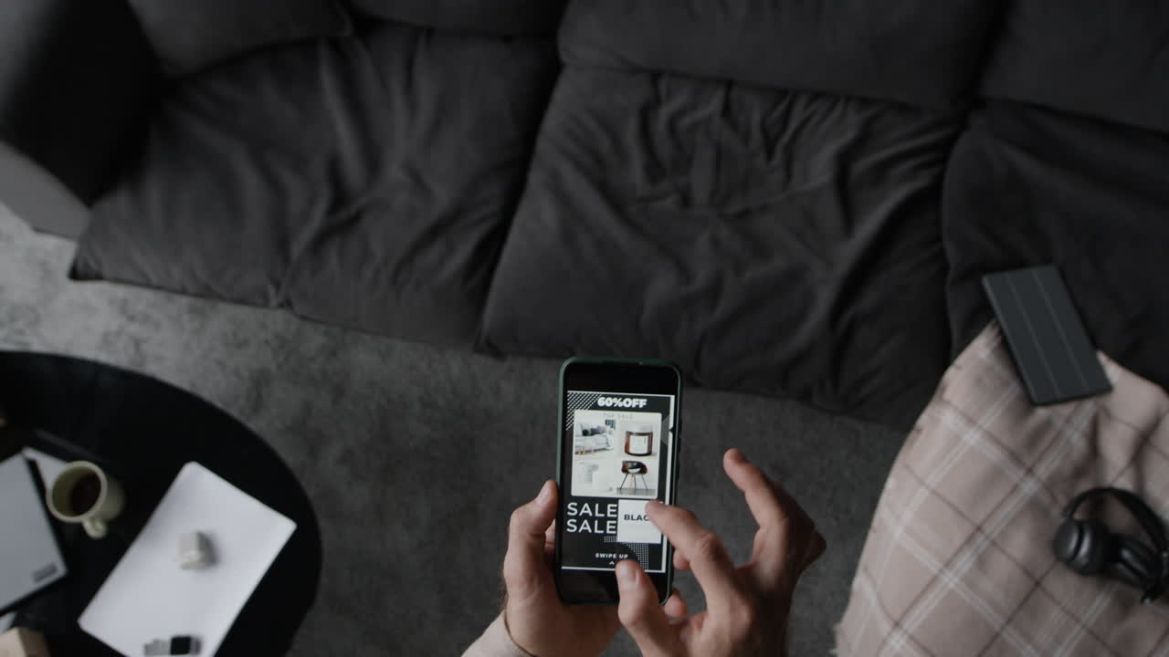 A person browsing a Black Friday sale on their smartphone