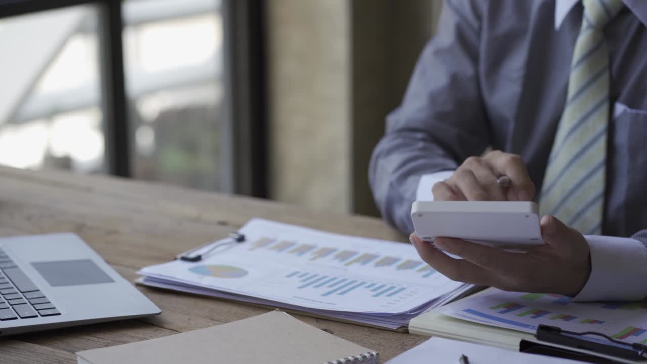 Business people develop business projects and analyze market data working in the office with business reports and stock analysis documents. paperwork concept