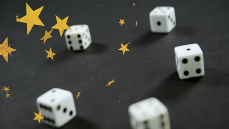 Animation-of-gold-stars-falling-over-white-and-red-dice-on-grey-background