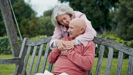 Love,-hug-and-old-couple-on-bench-in-garden