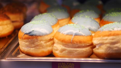 a tray of freshly glazed donuts