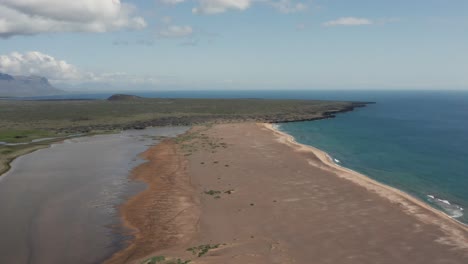 Amazing-scenery-of-popular-red-beach-at-West-Fjords-in-Iceland,-aerial