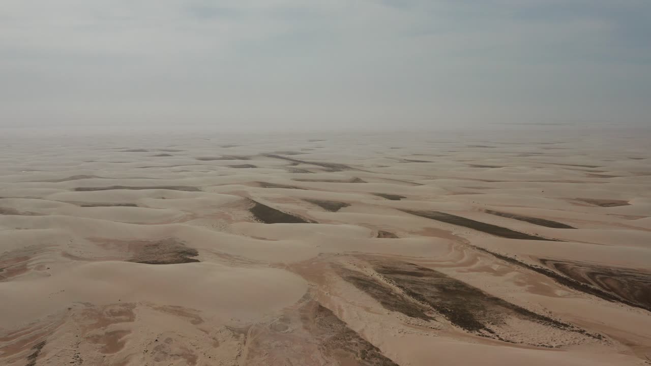 Aerial View of Sand Dunes in the Desert