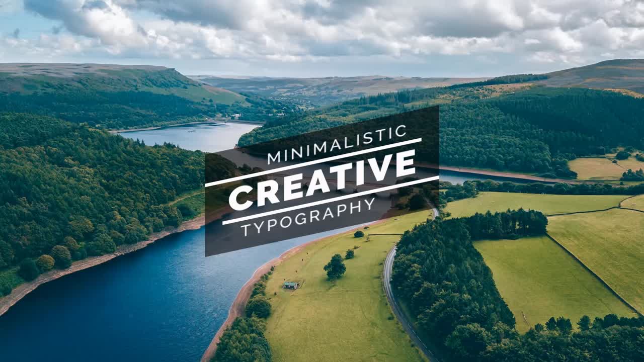 Aerial View of a Scenic Valley with River and Lake
