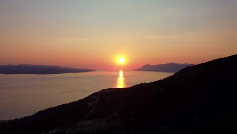 footage of a amazing sunset over the sea off maraska, croatia