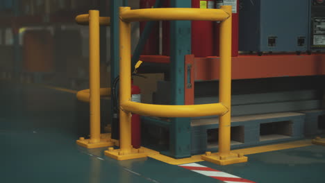 fire extinguisher and pallet rack in a warehouse