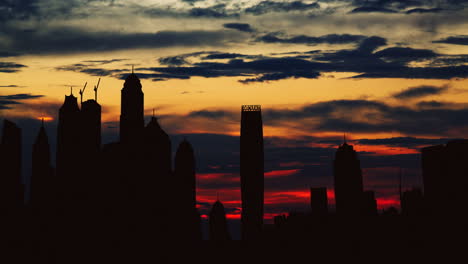 silhouette of city skyline at sunset