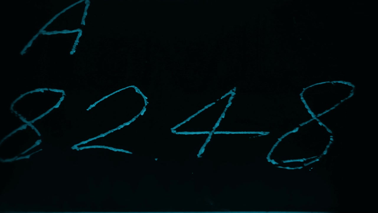 Vintage Film Leader with Glowing Blue Text and Abstract Patterns