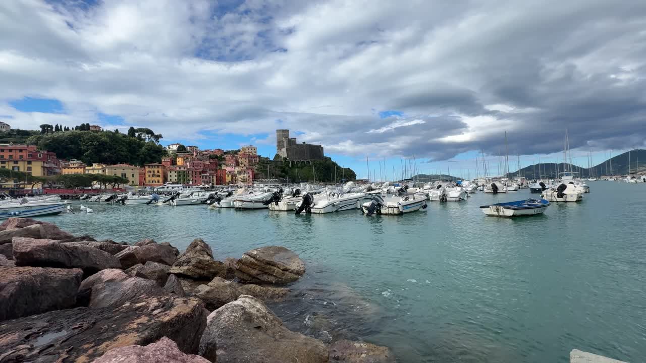 Lerici harbor on a sunny day with big white clouds