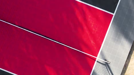 People-Playing-Pickleball-on-Outdoor-Sport-Court---Aerial-Conceptual-View