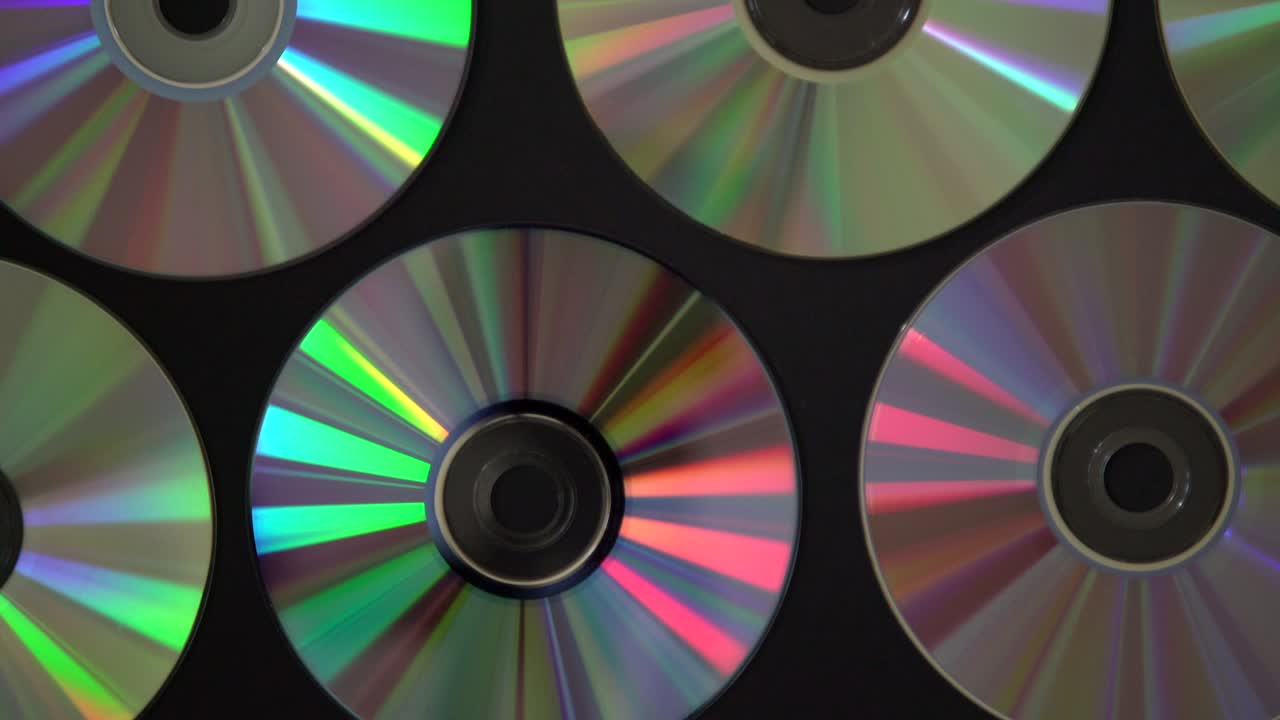 fondo de discos de cd o dvd antiguos, discos de círculo antiguos utilizados para el almacenamiento de datos, compartir películas y música