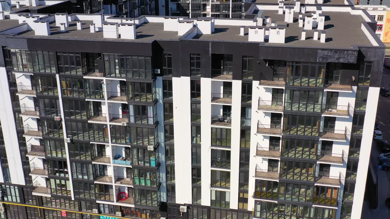 Aerial view of residentail community. Exterior of high rise multi story apartment building