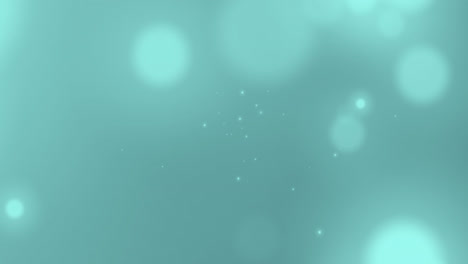 animation of spots of light against blue gradient background with copy space