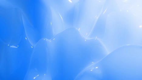 stylish abstract looped background, changing surface of soft translucent material. creative soft bright 3d bg with inner glow for festive events 4k. blue gradient.