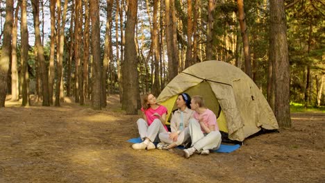 friends camping in forest