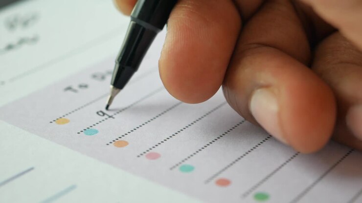 Hand writing on a to do list
