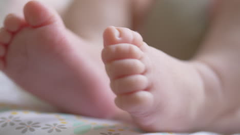 little bare feet of the baby