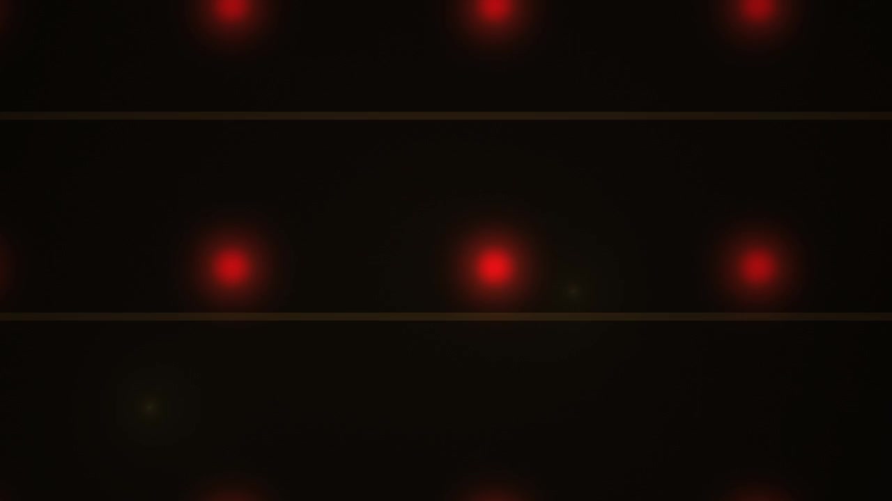 Rows of Glowing Red LED Lights on Dark Background