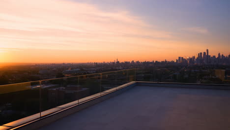 stunning city skyline view from a rooftop terrace at sunset