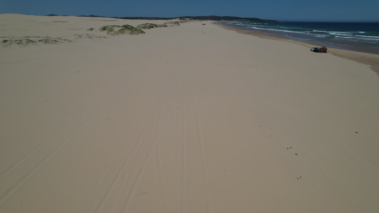 Flying Above Sand Dunes Of Stockton Beach In Anna Bay, New South Wales, Australia. aerial shot